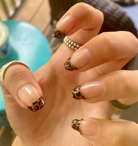 leopard french tip nails